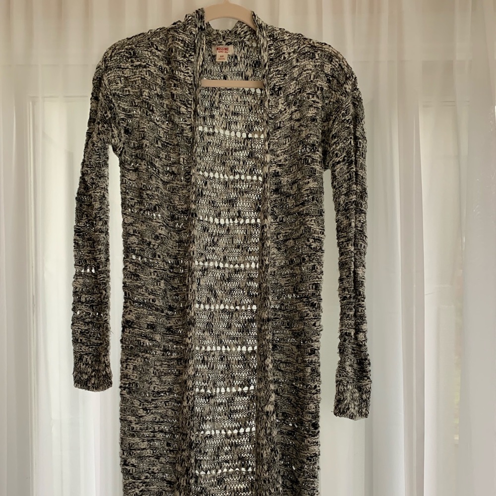 Duster length black and white marked sweater